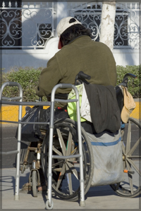 Homeless man in a wheelchair.